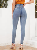 Jeans skinny con zip con vita alta