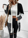 Cardigan duster color block spalle cadenti trecce a maglia