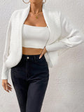 Cardigan monocolore aperto davanti