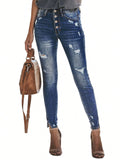 Jeans skinny strappati con bottone